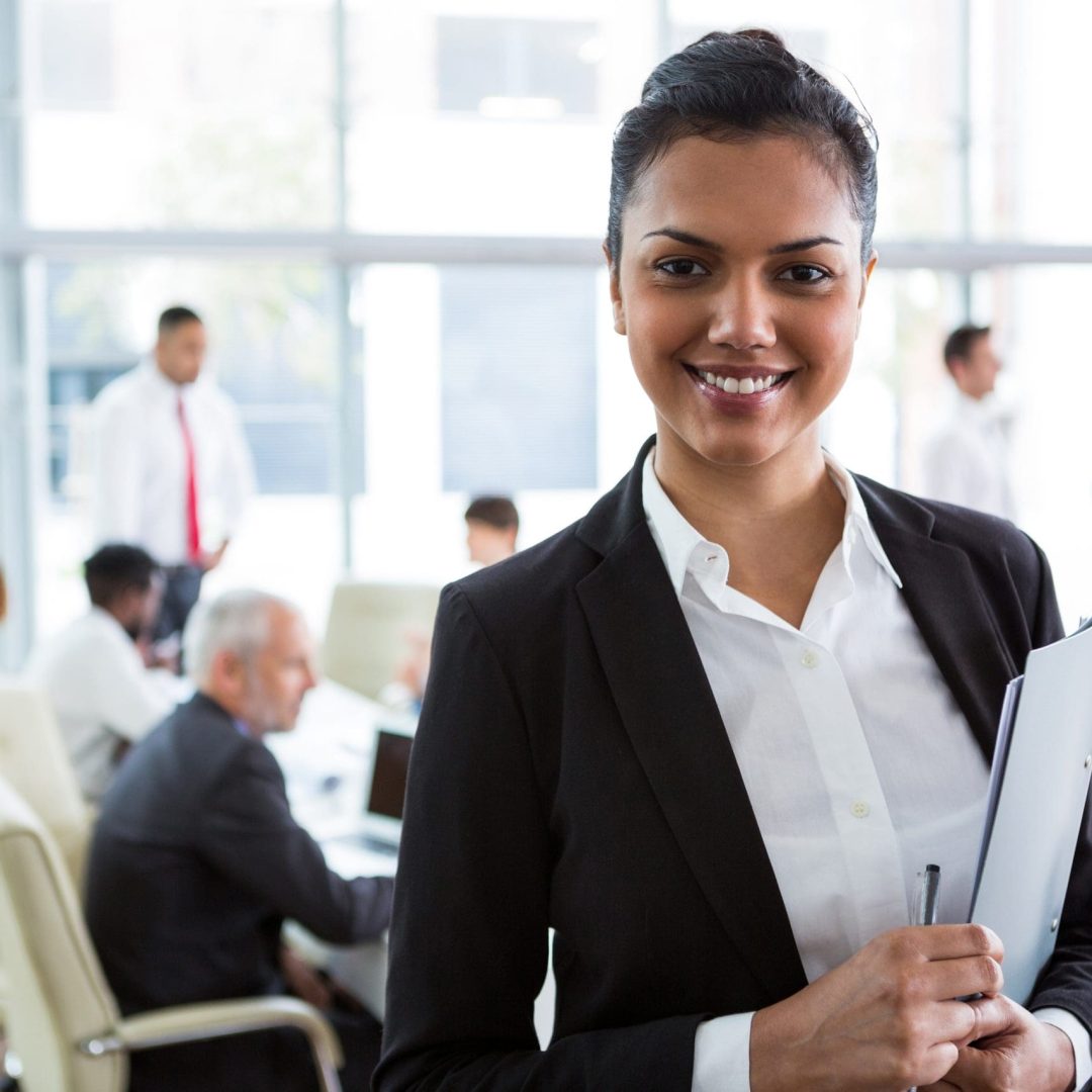 Portrait of smiling businesswoman in office Portrait of smiling businesswoman in office